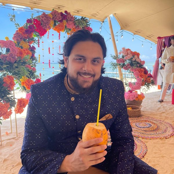 Tristan sipping on coconut juice