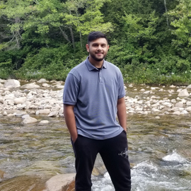 Tristan Persaud along the river