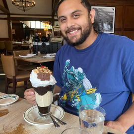 Tristan Persaud enjoying dessert