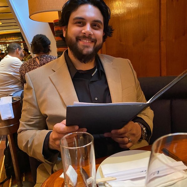Tristan Persaud enjoying dinner